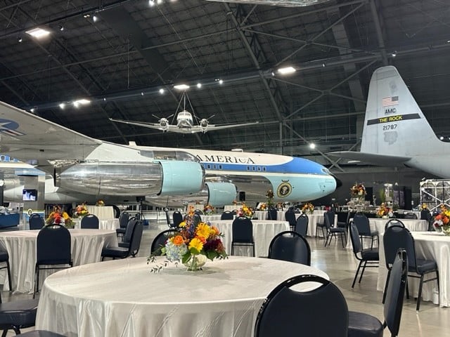Party tables and a presidential aircraft at the National Museum of the USAF's Presidential Gallery.